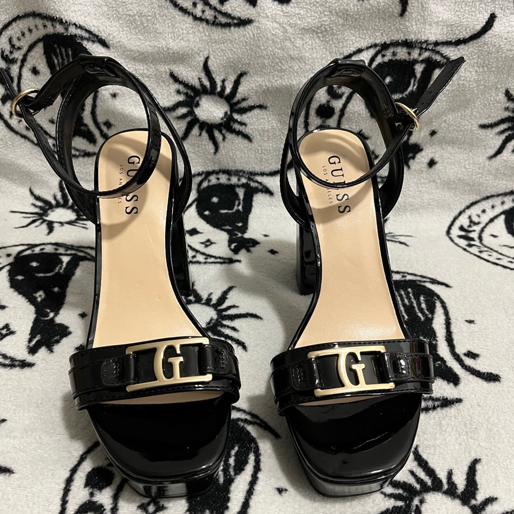 Black Guess platform heels used once like new